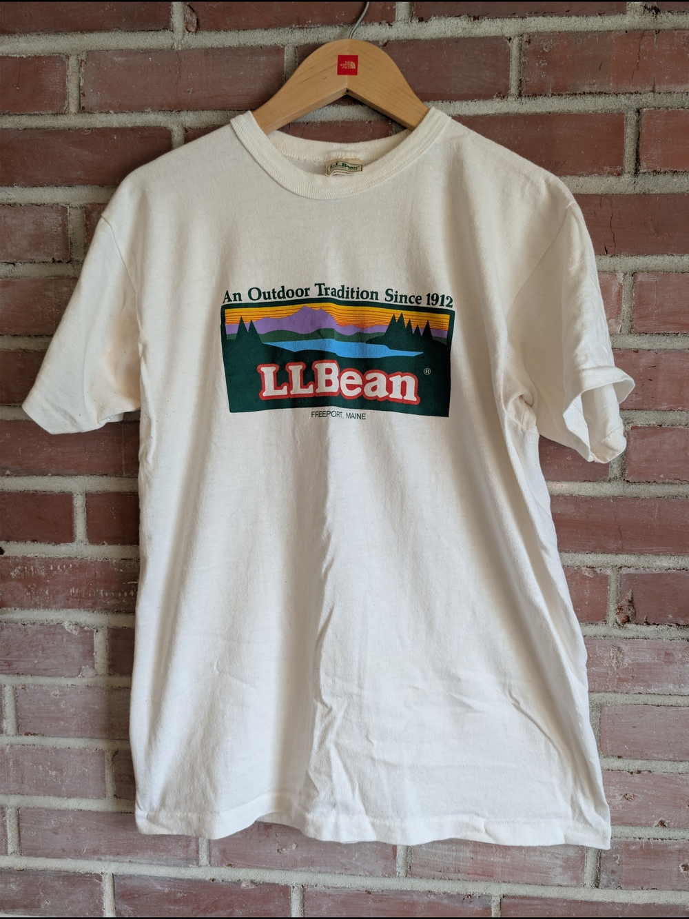L.L. Bean Cream Tee with Multicolor Outdoor Logo